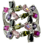 Silver ring with alpanite and synthetic stones