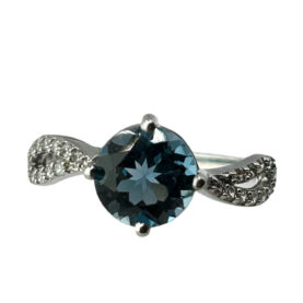 Silver ring with London topaz and synthetic stones