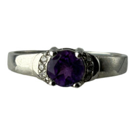 Silver ring with amethysts and synthetic stones