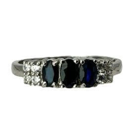 Silver ring with sapphires and synthetic stones