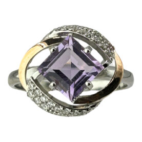 Silver ring with amethysts and synthetic stones